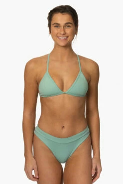 Alanna Bikini Bottom - Newport -JOLYN Sales Surf Bottoms Alanna Solid Newport Front MiaClark 011623