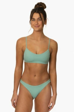 Kelia Bikini Bottom - Newport -JOLYN Sales Surf Bottoms Kelia Solid Newport Front2 MiaClark 011623