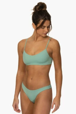 Kelia Bikini Bottom - Newport -JOLYN Sales Surf Bottoms Kelia Solid Newport SideFront MiaClark 011623