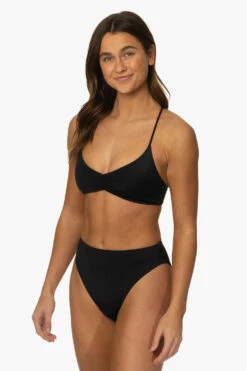 Leandra Bikini Bottom - Black -JOLYN Sales Surf Bottoms Leandra Solid Black SideFront MiaClark 011623