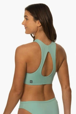 Gwen Bikini Top - Newport 19 Gwen Bikini Top - Newport -JOLYN Sales Surf Tops Gwen Solid Newport SideBack MiaClark 011623