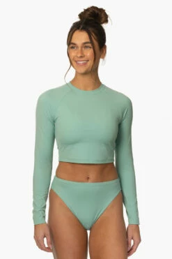 Moana Long Sleeved Crop Rashie - Newport -JOLYN Sales Surf Tops Moana Solid Newport Front MiaClark 011623