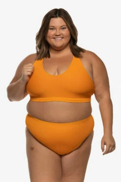 Natia Bikini Bottom - Mandarin 18 Natia Bikini Bottom - Mandarin -JOLYN Sales Swim Bottoms Natia Solid Mandarin Front Carly 060922
