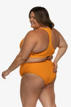 Natia Bikini Bottom - Mandarin 19 Natia Bikini Bottom - Mandarin -JOLYN Sales Swim Bottoms Natia Solid Mandarin Side Carly 060922