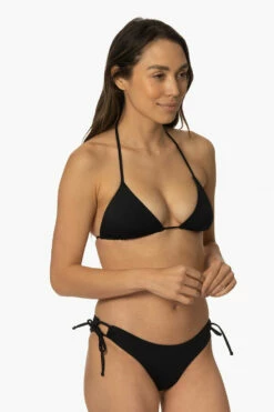 Trestles Bikini Bottom - Black 6 Trestles Bikini Bottom - Black -JOLYN Sales Swim Bottoms Trestles Solid Black FrontSide TiaSurf MonicaWalsh 020923