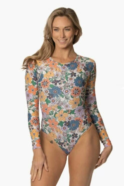 Endure Onesie - Magnolia 13 Endure Onesie - Magnolia -JOLYN Sales Swim Onesies Endure Print Magnolia Front CourtneySurf ChristinaQuakernik 021123