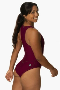 Fairlie Water Polo Suit - Cabernet 9 Fairlie Water Polo Suit - Cabernet -JOLYN Sales Swim Onesies Fairlie Solid Cabernet SideBack KianiSouza 112222