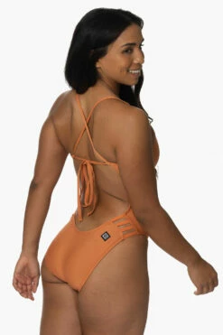 Gavin Swim Onesie - Tawny 8 Gavin Swim Onesie - Tawny -JOLYN Sales Swim Onesies Gavin Recycled Forever Solid Tawny SideBack KianiSouza 120122