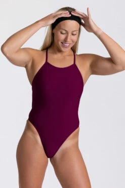 Jackson 4 Swim Onesie - Cabernet -JOLYN Sales Swim Onesies Jackson 4 Solid Cabernet CAB Front2 HollyMaine 060123