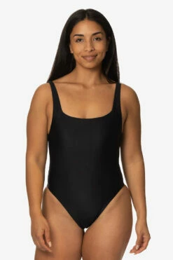 Nova Scotia Surf Onesie - Black -JOLYN Sales Swim Onesies Nova Scotia Solid Black Front TiaSurf KianiSouza 020923 c6fcd2c9 9dd1 4576 8d8e 6a54c1d2edf0