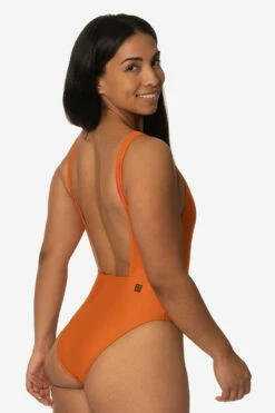 Front Page -JOLYN Sales Swim Onesies Nova Scotia Solid Ginger Back Side TiaSurf KianiSouza 020923