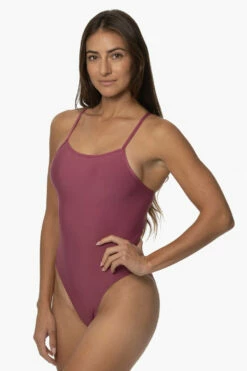 Perry Swim Onesie - Plum 13 Perry Swim Onesie - Plum -JOLYN Sales Swim Onesies Perry Recycled Forever Solid Plum SideFront KarolMartin 121322