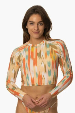 Moana Long Sleeved Crop Rashie - Zuma 12 Moana Long Sleeved Crop Rashie - Zuma -JOLYN Sales Swim Tops Moana Prints Zuma Front MichelleMason JSD2.23 030723