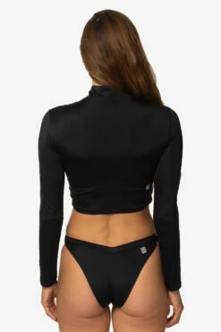 Tofino Long Sleeved Crop 1/4 Zip-up Rashie - Black 9 Tofino Long Sleeved Crop 1/4 Zip-up Rashie - Black -JOLYN Sales Swim Tops Tofino Solid Black Back TiaSurf MiskaSykora 021023