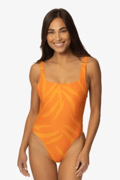 Nova Scotia Surf Onesie - Pyramid -JOLYN Sales Swim Onesie Novascotia Pattern Pyramids Front LisaDillon 040323